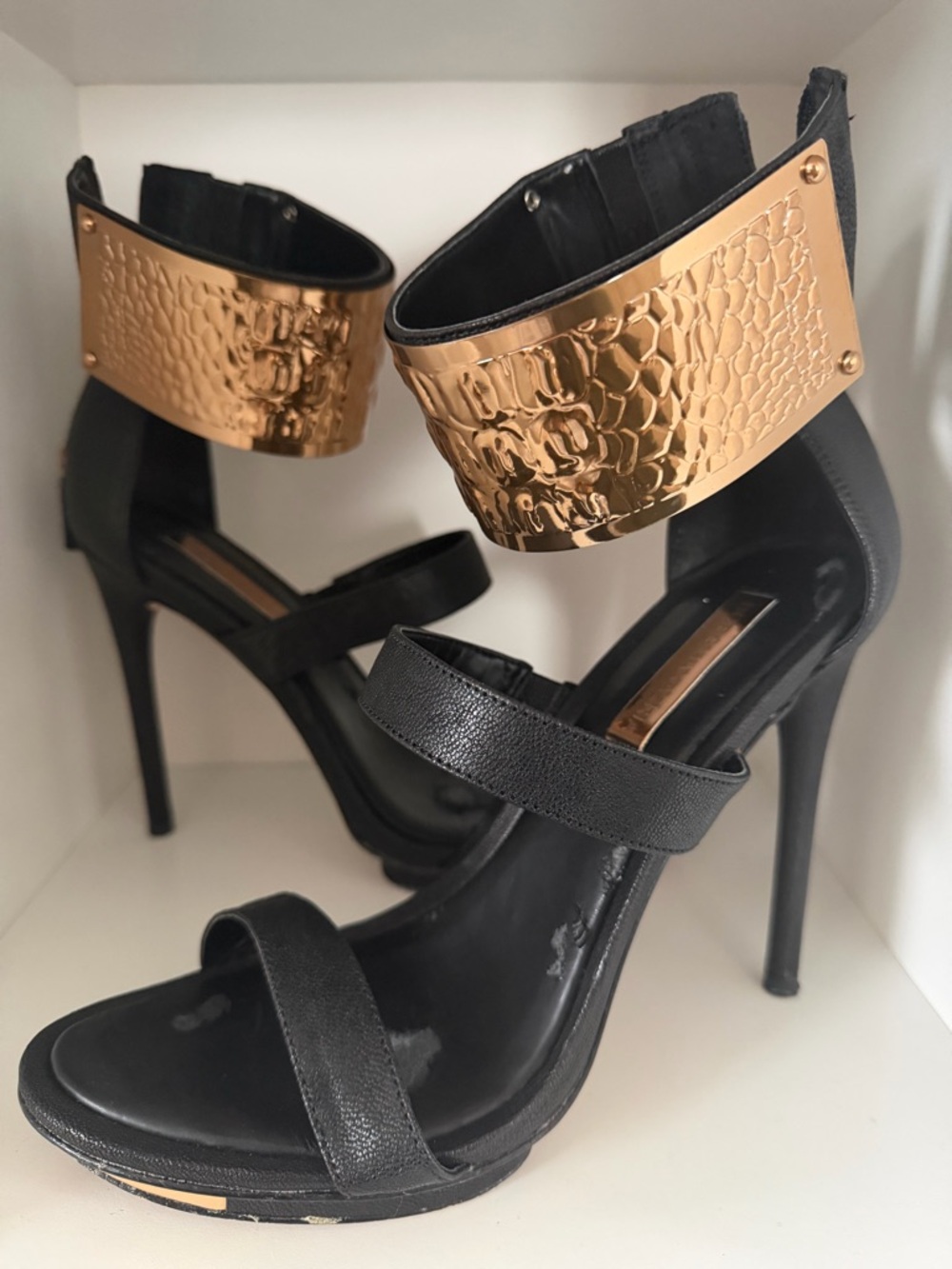 BCBGMAXAZRIA Black High Heel Ankle-Cuff Sandals with Gold Plate